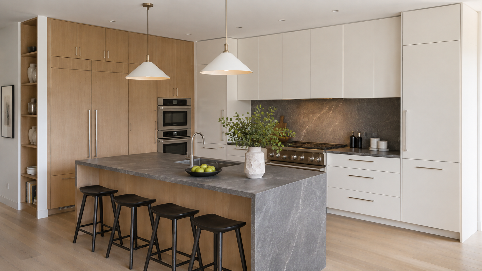 Full-height pantry cabinets integrated into a two-tone kitchen